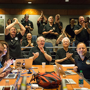 Part of the New Horizons team celebrating the spacecraft's flyby of Pluto.